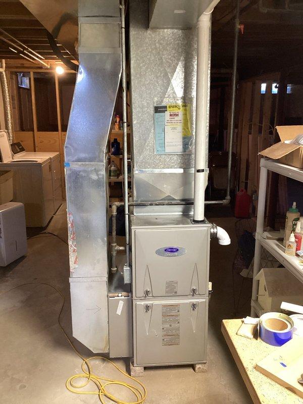 Responded to no-heat call for Carrier furnace unit installed in customer's basement. Upon inspection, identified faulty igniter preventing system startup. Replaced igniter assembly, cleaned flame sensor, and verified proper ignition sequence. System now operating correctly with consistent flame and adequate heat output throughout home.