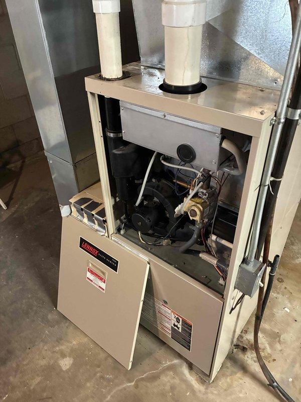 Responded to no heat complaint on Lennox furnace less than 10 years old. Inspection revealed failed inducer motor preventing proper system operation. Replaced inducer motor assembly, verified proper installation of all electrical connections, and tested system through multiple heating cycles. Unit now functioning correctly with normal flame pattern and appropriate temperature rise.