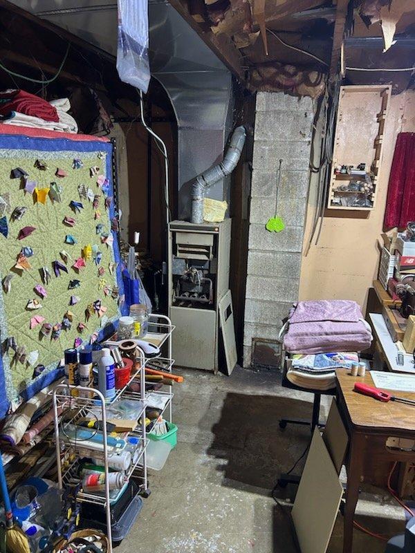 Responded to no heat call for a Goodman furnace less than 10 years old. Upon inspection, discovered significant dust accumulation on internal components and heat exchanger. Removed front panel, thoroughly cleaned dust buildup from critical components, and restored proper operation. Unit now functioning correctly with normal heat output.