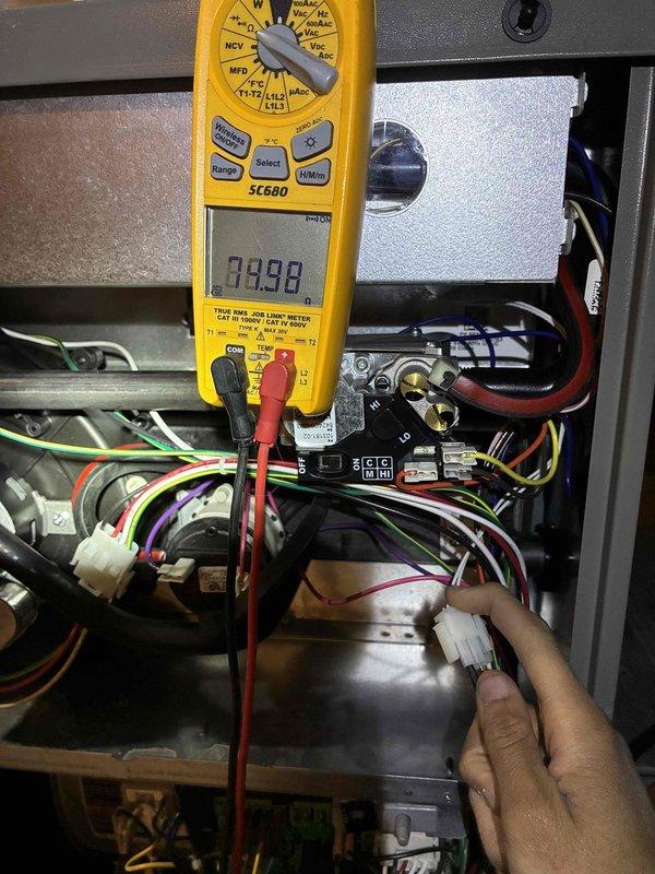 Performed routine HVAC tune-up service including replacement of air filter with new pleated filter. Conducted electrical diagnostics using Fieldpiece SC680 multimeter, measuring terminal voltage at 39.98V and inspecting wiring connections. All components tested within normal operating parameters.