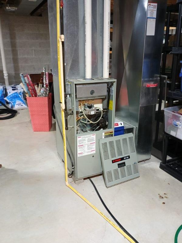 Responded to no heat complaint for a gas furnace less than 10 years old. Inspection revealed faulty gas valve (E-X model) with electrical connection issues. Replaced defective gas valve, verified proper ignition sequence, and confirmed normal system operation throughout heating cycle. Unit now functioning correctly with appropriate flame characteristics and temperature rise.