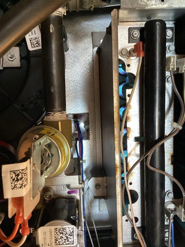 Performed diagnostic inspection of furnace interior components, examining electrical connections and control modules. Identified and replaced faulty pressure switch that was preventing proper system operation. Tested system after repair, confirming all components functioning within normal parameters and restoring heat to residence.