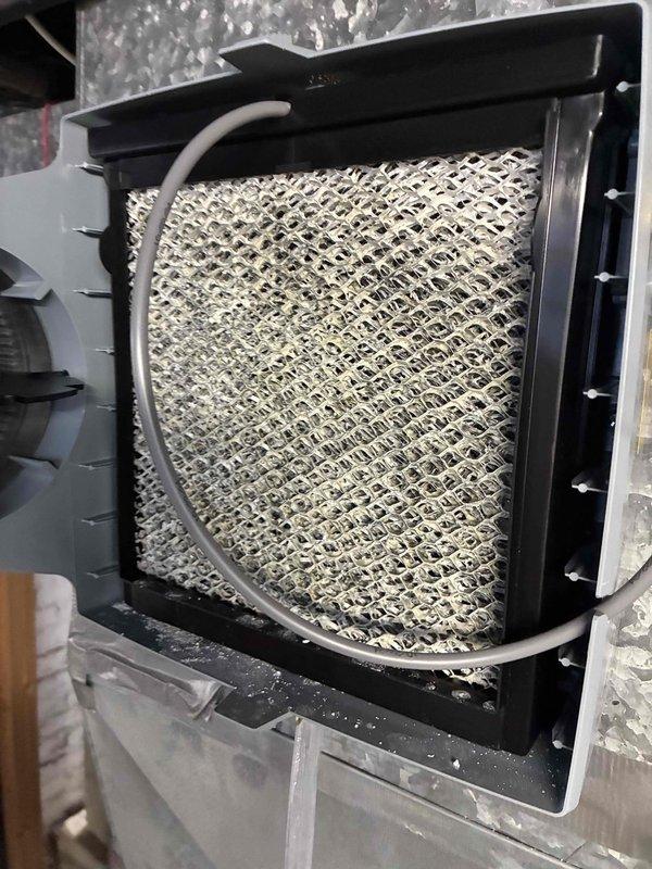 Performed routine maintenance tune-up on HVAC system, including inspection of air filter which showed significant dust accumulation requiring replacement. Conducted temperature differential testing using probe to verify proper system operation and cooling performance. All components now functioning within normal parameters.