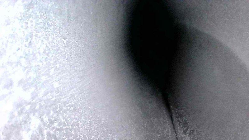 Performed maintenance service on American Standard Freedom 80 furnace. Identified and documented frost/ice formation on evaporator coil indicating potential refrigerant flow issues. Completed visual inspection of unit components and ventilation system to ensure proper operation.