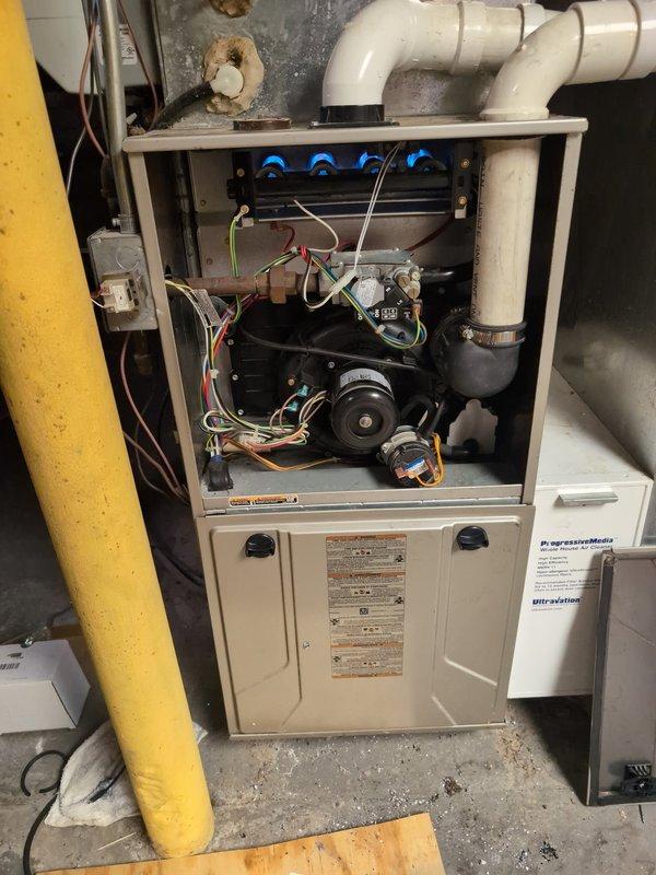 Responded to no heat complaint on 10+ year old gas furnace. Upon inspection, found failed ignition sequence due to dirty flame sensor. Cleaned flame sensor, inspected burners and venting system, and performed system test. Unit now operating normally with proper flame recognition and consistent heat output.