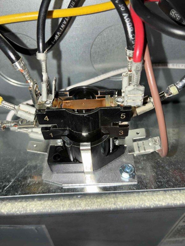 Performed warranty inspection on Goodman HVAC unit (model S0602UBV000AAF). Examined electrical components including 1/4 HP motor and control board. Inspected relay switch with multiple terminal connections (1,3,4,5) and verified proper wiring configuration of all connections (red, yellow, black, white, and pink wires).