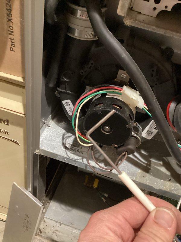 Performed comprehensive tune-up service on HVAC system including electrical component testing and diagnostics. Conducted thorough inspection of blower motor assembly, examining all electrical connections and wiring integrity. Utilized digital diagnostic equipment to verify proper voltage readings and system functionality, ensuring optimal performance of the unit.