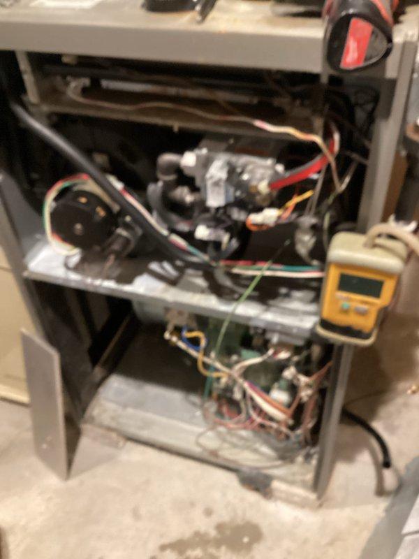 Performed comprehensive tune-up service on HVAC system including electrical component testing and diagnostics. Conducted thorough inspection of blower motor assembly, examining all electrical connections and wiring integrity. Utilized digital diagnostic equipment to verify proper voltage readings and system functionality, ensuring optimal performance of the unit.