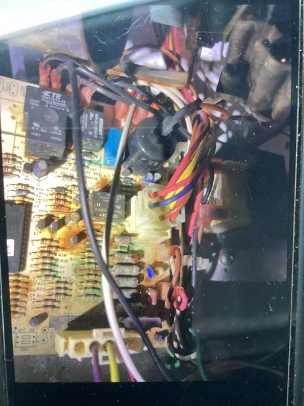 Diagnosed and repaired circuit board failure in aging furnace causing no-heat condition. Identified faulty pressure switch with significant condensation buildup on internal components. Replaced control board and pressure switch assembly, restoring proper heating operation after thorough system testing.