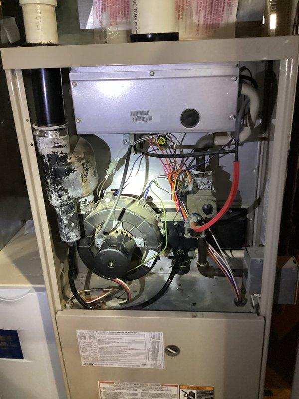 Responded to no-heat call for aging furnace (10+ years). Upon inspection, found faulty blower motor and worn electrical connections. Removed access panel, replaced blower motor assembly, cleaned interior components, and reconnected wiring harnesses. System now functioning properly with restored heat output.
