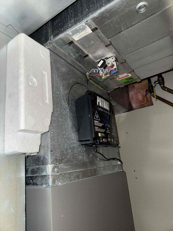 Performed comprehensive tune-up on HVAC system, including inspection of ductwork, refrigerant lines, and drainage components. Examined and tested UV light purification system with warning indicators functioning properly. Inspected control module with digital display and verified proper operation of all electrical connections and control wiring. System is now operating at optimal efficiency with all components properly maintained.