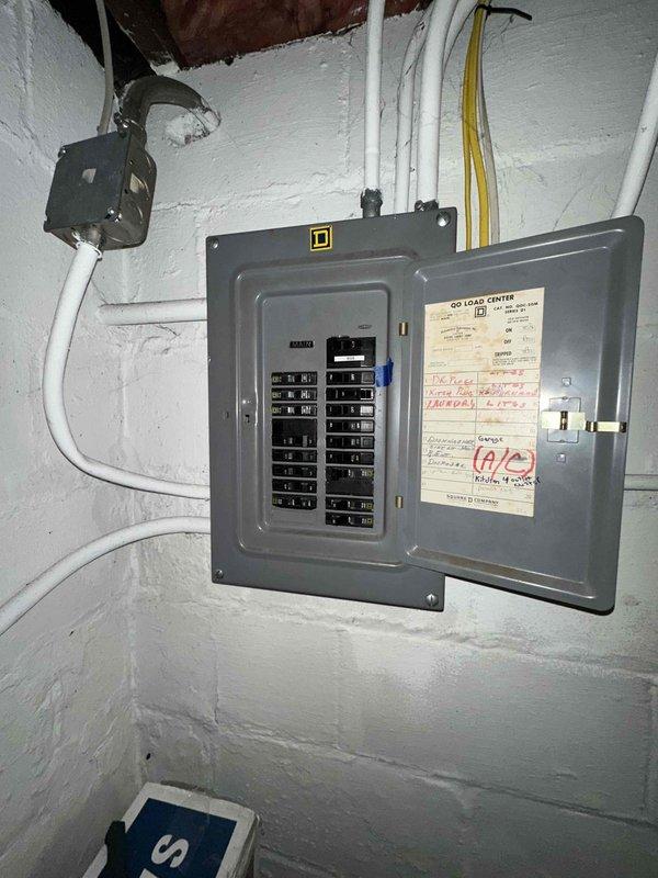 Performed comprehensive inspection of electrical panel and HVAC system in basement utility area. Evaluated existing furnace unit with connected ductwork and adjacent air handler for potential replacement. Documented current circuit breaker configuration and electrical capacity to ensure compatibility with proposed new equipment.
