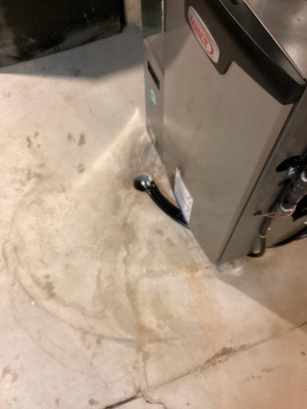 Successfully installed new furnace unit in basement utility area, mounting it on concrete floor with all necessary connections properly secured. Added digital thermostat control panel to wall, ensuring proper wiring through existing access point for complete system functionality.