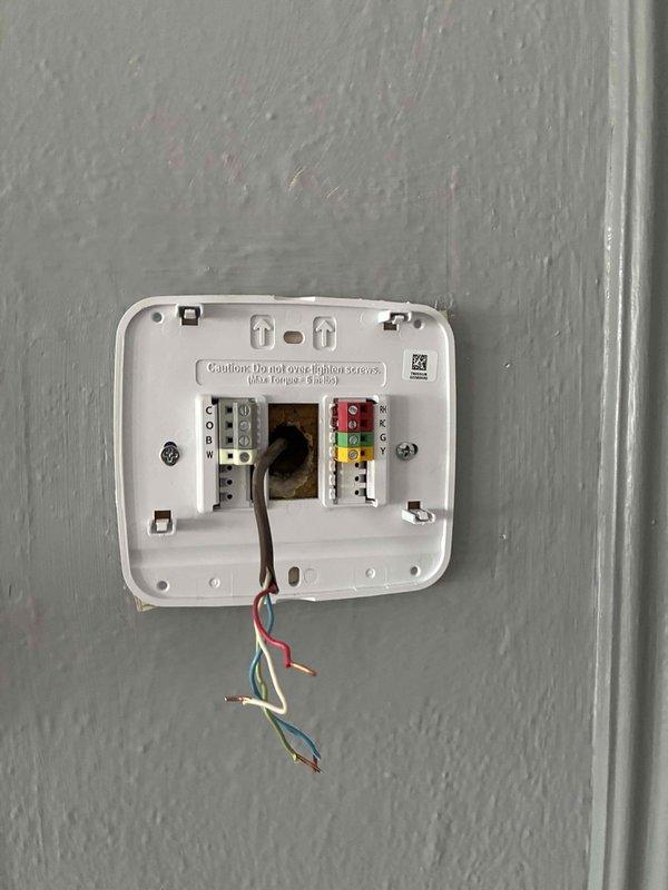 Completed thermostat replacement on Daikin HVAC system, installing new unit and connecting all control wiring (R, W, G, Y, B) according to manufacturer specifications. Verified proper system operation through heating and cooling cycle tests, ensuring communication between thermostat and furnace unit.