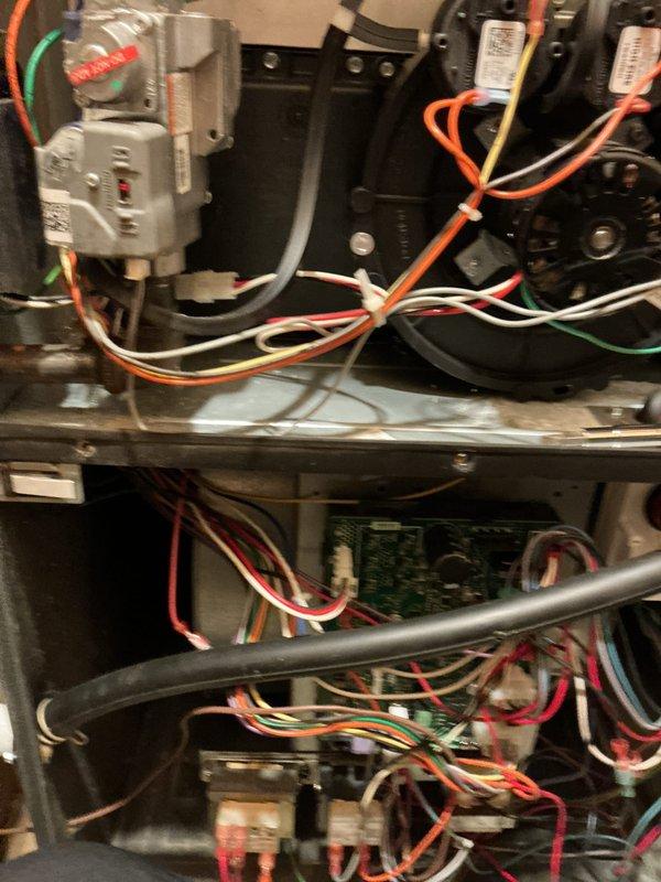 Performed comprehensive tune-up on gas furnace system. Inspected burner assembly confirming proper ignition with clean blue flame pattern. Examined electrical components including wiring connections and circuit board, ensuring all connections were secure and functioning correctly. System is operating within normal parameters after service.
