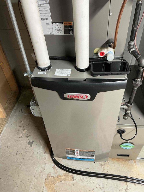 Completed preventative maintenance service on Lennox HVAC furnace system. Inspected all components for proper operation, cleaned key parts, and verified system performance. Temperature readings at register showed 138.5°F, indicating proper heating function within normal parameters.