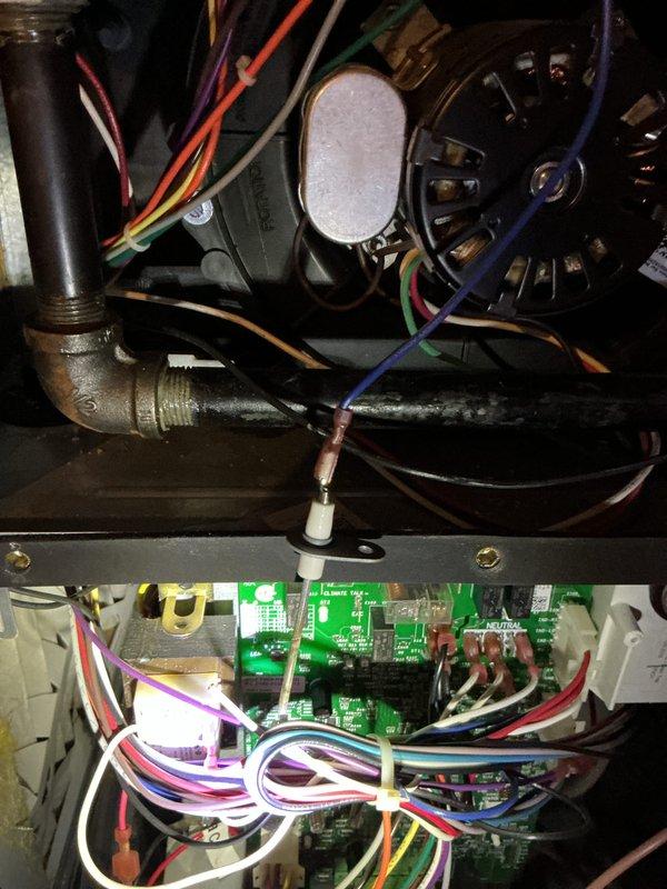 Performed scheduled maintenance on customer's gas furnace system. Inspected burner assembly confirming proper flame pattern with consistent blue flames indicating complete combustion. Examined and tested electrical components including circuit board, wiring connections, and blower motor, all found to be in good working condition.