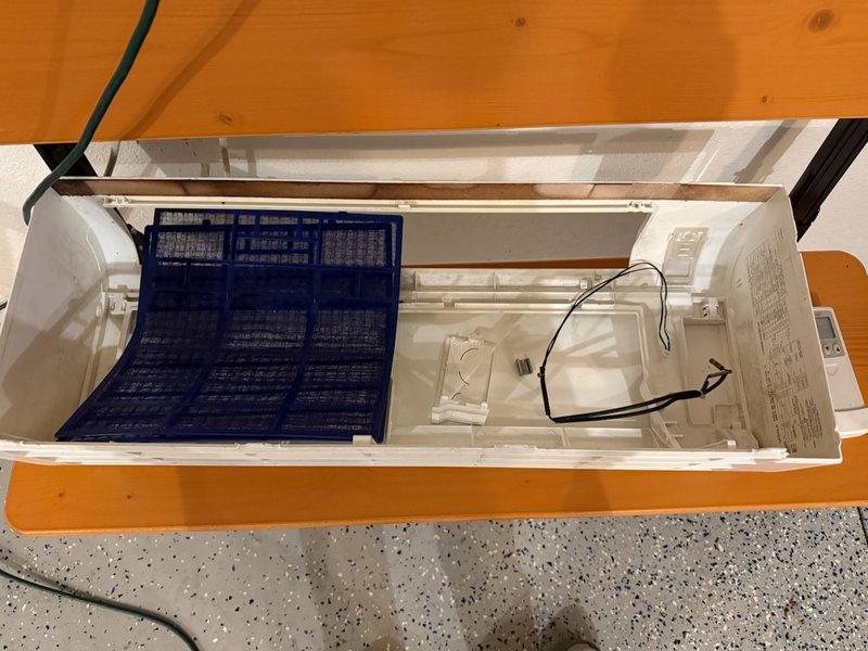 Responded to no-heat service call for system less than 10 years old. Diagnosed blower motor failure in air handler unit. Removed and replaced blower assembly after cleaning accumulated dust from fan coil unit and inspecting interior components. System restored to proper operation and heat function verified.