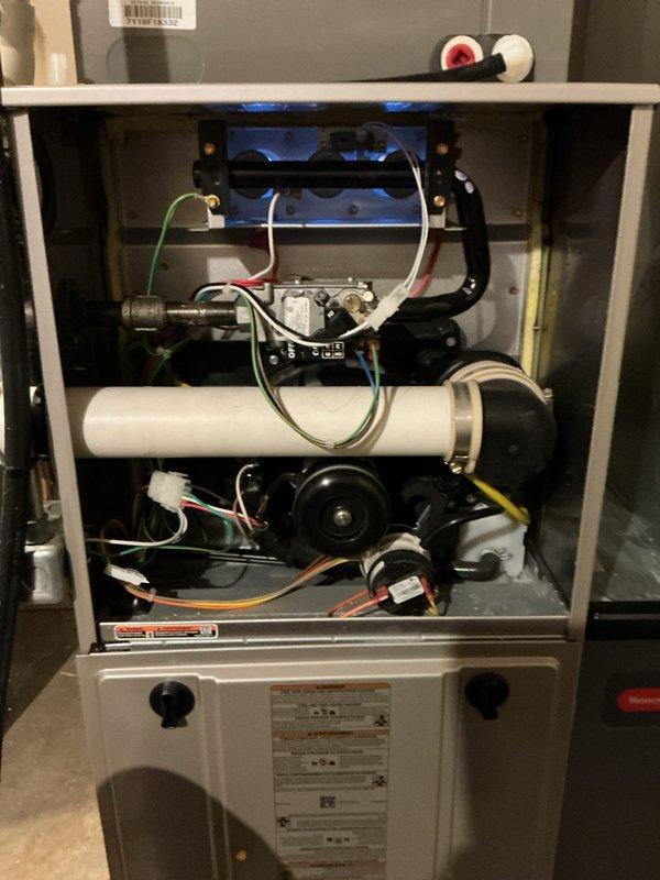 Performed scheduled preventive maintenance on residential HVAC furnace system. Inspected interior components including control board, wiring connections, condensate trap, and gas valves - all found in normal working condition. Examined blower assembly and verified proper operation of all mechanical components with no abnormalities detected.