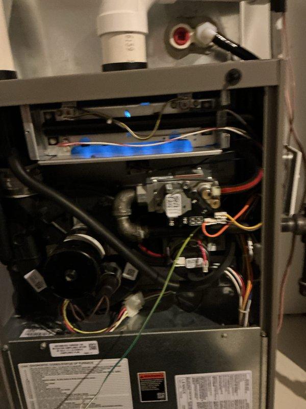Performed comprehensive tune-up on gas furnace system. Inspected internal components including electrical connections, ignitor probe, pressure switch, and control board - all functioning properly. Cleaned interior housing and verified proper operation of blower motor and gas valve. System is operating within manufacturer specifications with no safety concerns noted.