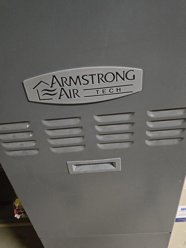 Performed preventative maintenance on Armstrong Air Tech furnace system. Inspected and cleaned all components including ventilation louvers, PVC exhaust/intake piping, and connected humidifier unit. System functioning properly with no issues detected.