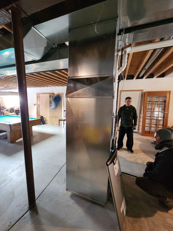 Successfully installed new furnace system in unfinished basement, including installation of metal ductwork, connection of PVC ventilation pipes, and proper integration with existing utility lines. System was tested for proper operation and all connections were verified secure prior to completion.