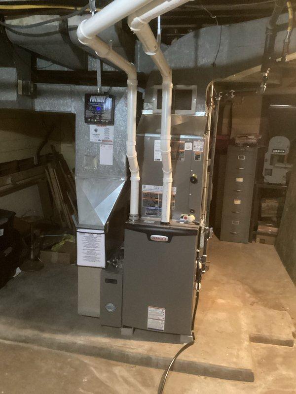 Successfully installed a complete Lennox HVAC system in the client's basement utility room. The installation included proper mounting of the furnace unit with appropriate PVC exhaust/intake ventilation, connection to existing ductwork, and verification of all system components for optimal performance.