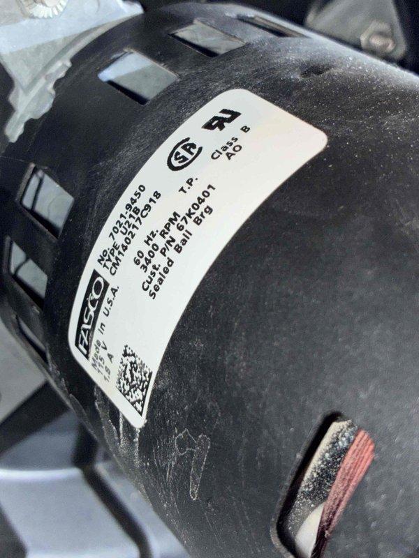 Responded to a "no heat" service call for furnace under 10 years old. Diagnosed failed inducer motor (FASCO brand) with visible dust accumulation. Replaced motor, performed system check, and verified proper burner ignition with normal flame pattern observed. Unit now operating within specifications and producing heat.