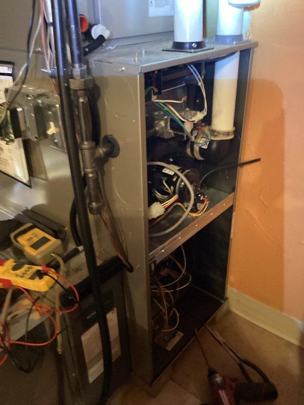 Performed scheduled maintenance inspection on residential HVAC system, accessing internal components of the furnace for comprehensive evaluation. Inspected electrical connections, control wiring, and mounting brackets for signs of wear; noted minor corrosion around cable entry point which was cleaned and treated to prevent further deterioration.