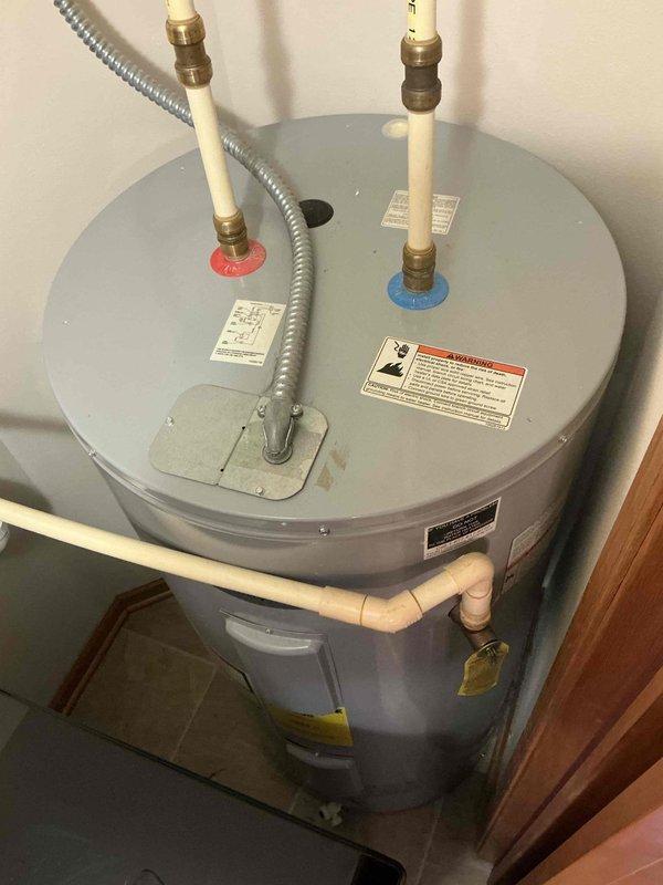 Conducted comprehensive inspection of residential water heater system. Documented existing unit showing signs of age with standard hot/cold water connections and electrical components. Provided estimate for full replacement of current water heater with new energy-efficient model, including removal of old unit, installation of new system with updated piping connections, and testing of proper functionality.