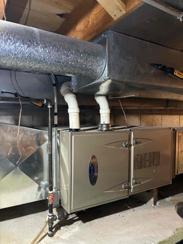 Responded to no heat call for residential system. Diagnosed issue with digital Honeywell thermostat showing 64°F indoor temperature despite 71°F heat setting. Verified furnace operation and ductwork integrity, confirming system was actively working to reach setpoint. Cleaned connections and confirmed proper thermostat function, restoring normal heating operation.