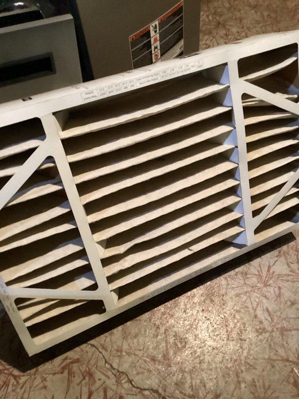 Responded to customer's no-heat call for unit less than 10 years old. Upon inspection, found clogged air filter restricting proper airflow through the system. Removed and replaced filter, cleaned internal components, and verified proper ignition sequence. System now operating at optimal performance with restored heat output.