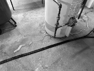 Performed routine maintenance on GE tanked water heater, including complete system flush to remove sediment buildup. Inspected all connections, valves, and pipes for proper function and potential leaks. Unit is operating efficiently with no issues detected.