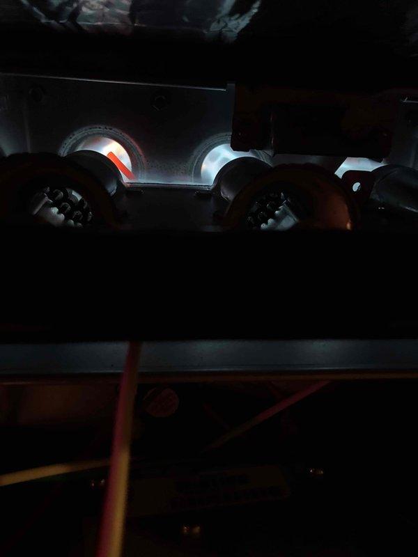 Performed routine maintenance on Bryant furnace in basement mechanical room. Inspected burner assembly and flame pattern, confirming proper combustion operation. Verified all ventilation systems and PVC exhaust piping were properly secured and functioning correctly.