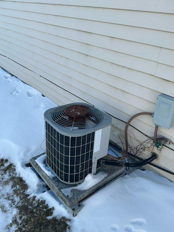 Completed replacement of existing HVAC system with new equipment including outdoor condenser unit installed on concrete pad and indoor furnace with proper ductwork connections. Installation included all necessary refrigerant lines, electrical connections, PVC venting, and condensate drainage to ensure full system functionality and compliance with manufacturer specifications.