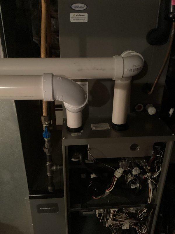 Responded to no heat call for Honeywell furnace less than 10 years old. Inspection revealed faulty circuit board causing system failure. Replaced defective board, verified proper operation of all electrical components, and tested system through complete heating cycle. Unit now functioning correctly with normal flame pattern and proper exhaust venting through PVC piping system.