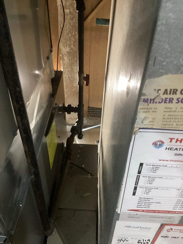 Completed installation of new furnace unit with proper mounting and electrical connections. Inspected interior components for proper assembly and verified all manufacturer labels and specifications. Connected control unit to power supply and completed final system check to ensure proper operation.