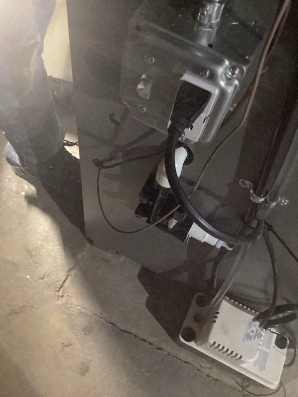 Completed installation of new furnace unit with proper mounting and electrical connections. Inspected interior components for proper assembly and verified all manufacturer labels and specifications. Connected control unit to power supply and completed final system check to ensure proper operation.