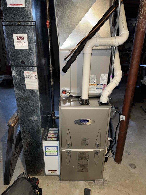 Performed routine maintenance tune-up on Carrier furnace system with attached ROTH air handler. Inspected control panel functionality, verified proper operation of electronic components, and ensured all connections were secure. System is operating within normal parameters with no issues detected.