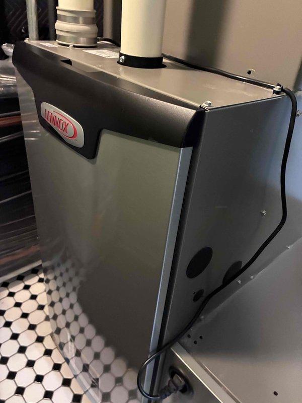 Performed routine maintenance on Lennox HVAC system, including inspection of all components and electrical testing. System readings showed normal operation at 52.8 on SC680 multimeter. Equipment is in good condition with proper installation of PVC venting and electrical connections.