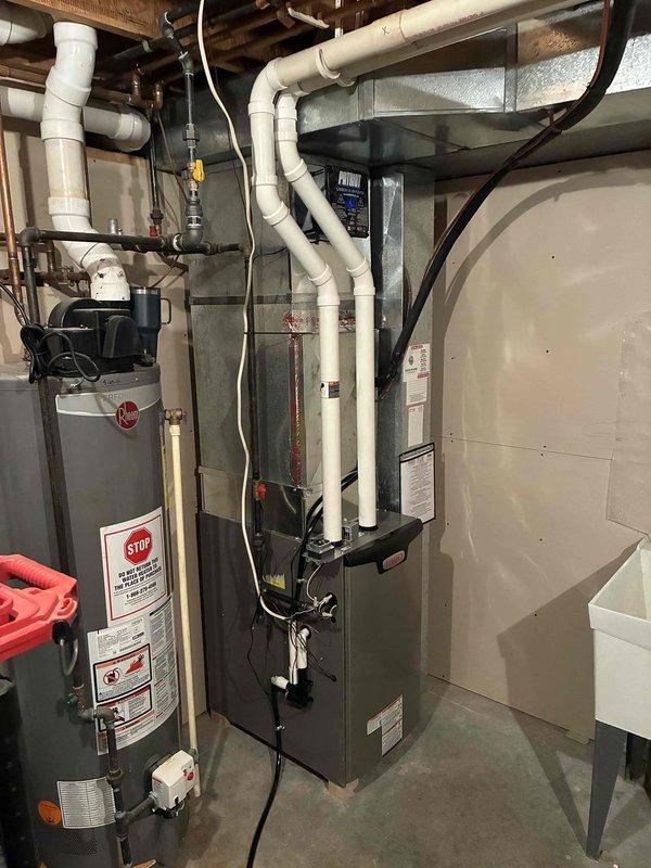 Successfully installed a high-efficiency furnace with properly configured PVC intake and exhaust venting. Connected all necessary ductwork and electrical components according to manufacturer specifications. System was tested and verified to be operating at optimal performance levels.