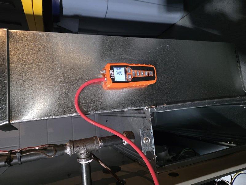 Completed furnace installation with successful system commissioning. Performed pressure testing using digital manometer, confirming proper gas pressure readings of 9.08" WC, which falls within manufacturer specifications. All connections were verified and system operation validated prior to completion.