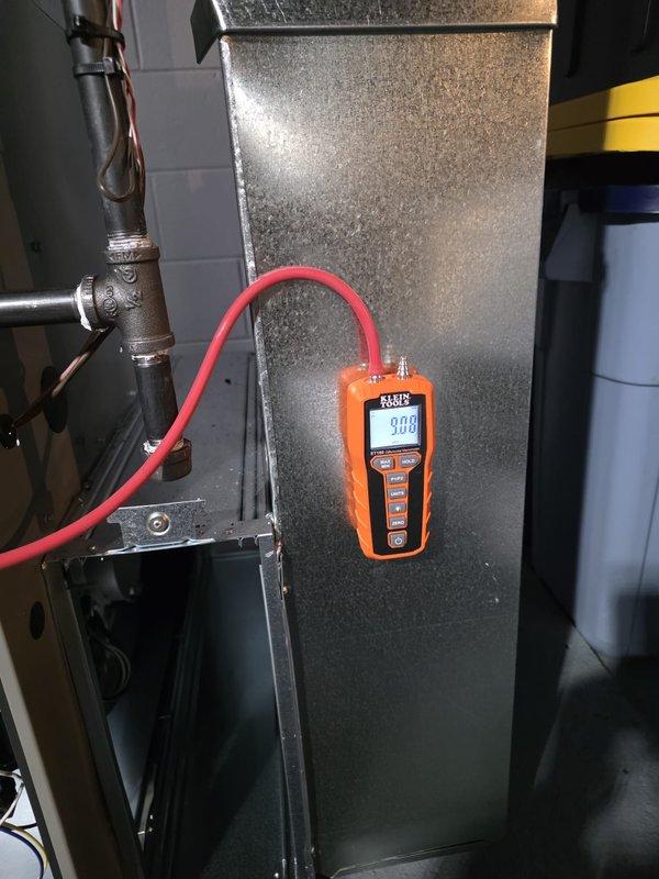 Completed furnace installation with successful system commissioning. Performed pressure testing using digital manometer, confirming proper gas pressure readings of 9.08" WC, which falls within manufacturer specifications. All connections were verified and system operation validated prior to completion.