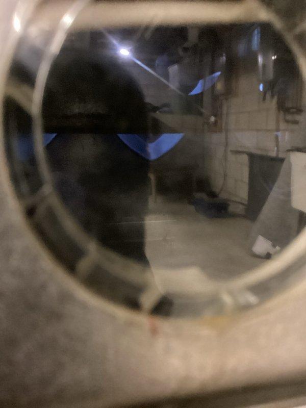 Responded to no-heat call for aging residential furnace (10+ years old). Upon inspection, removed front panel to access internal components and found faulty igniter preventing system startup. Replaced igniter assembly, cleaned flame sensor, and inspected heat exchanger through viewing port. System now operating correctly with proper ignition sequence and heat output.