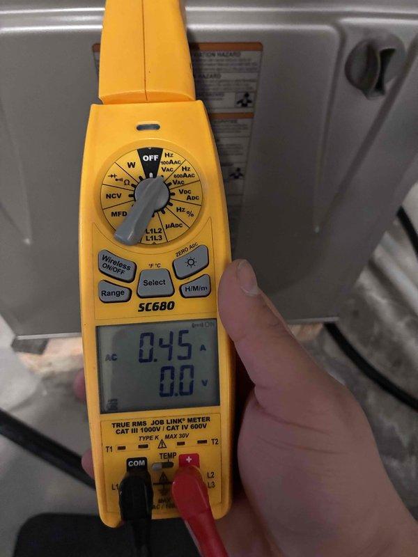 Performed comprehensive HVAC tune-up service including electrical system diagnostics with SC680 clamp meter, recording amperage readings of 0.45. Completed inspection and reconnection of control wiring at the electrical panel, ensuring proper terminal connections for all control circuits (red, yellow, green, blue, and white wires).