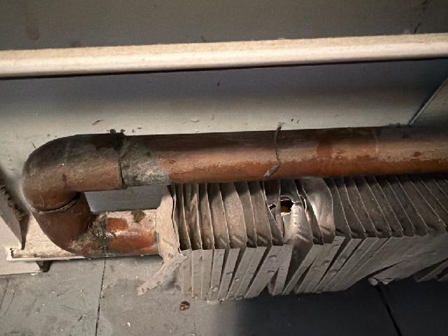 Responded to no heat complaint. Inspection revealed significant corrosion and deterioration of copper piping connected to baseboard heating system. Observed oxidation at pipe joints and damaged heat exchanger fins. Replaced corroded copper sections and repaired compromised connections to restore proper heat flow. System now functioning normally.