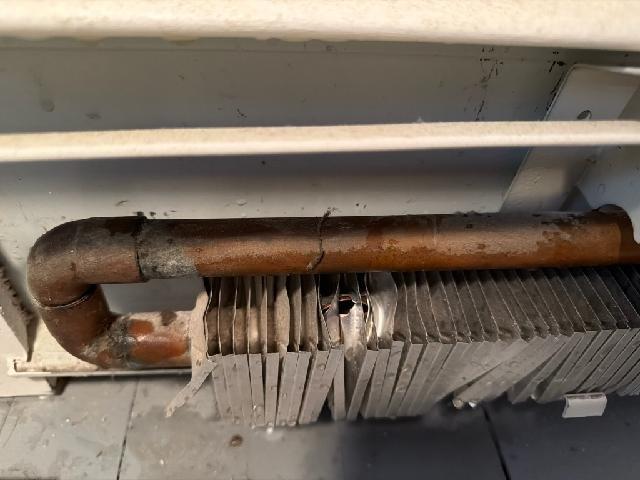 Responded to no heat complaint. Inspection revealed significant corrosion and deterioration of copper piping connected to baseboard heating system. Observed oxidation at pipe joints and damaged heat exchanger fins. Replaced corroded copper sections and repaired compromised connections to restore proper heat flow. System now functioning normally.
