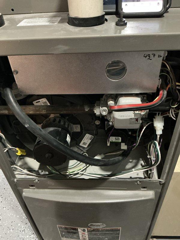 Responded to no-heat call for furnace under 10 years old. Accessed unit and observed internal components including blower assembly and control board. Identified faulty limit switch causing system shutdown at 49.7°F. Replaced defective limit switch, tested system operation through multiple heating cycles, and verified proper temperature rise. Unit now functioning correctly with no safety issues.