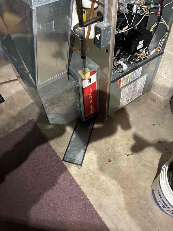 Performed comprehensive HVAC tune-up service on residential furnace system, including inspection of electrical components and control systems with access panel removed. Conducted gas pressure testing using digital manometer, which registered at 3.75" WC, confirming proper gas supply within manufacturer specifications. Inspected all connections, ductwork, and ventilation components, verifying system is operating at optimal efficiency with no safety concerns identified.