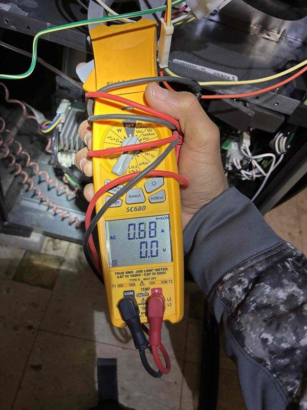 Performed scheduled tune-up on HVAC system, including electrical testing with multimeter to verify proper voltage and amperage readings. Inspected and secured loose wiring connections, ensuring all fasteners and clips were properly attached to system components. System was returned to normal operating condition with all measurements within manufacturer specifications.
